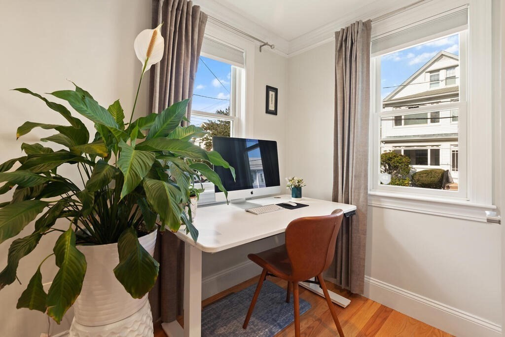19 Foster Street, Unit 19 Arlington, MA 02474 - Photo 7 of 33 a view of a workspace with furniture and a window