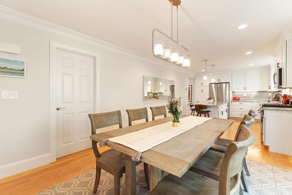 19 Foster Street, Unit 19 Arlington, MA 02474 - Photo 9 of 33 a view of a dining room with furniture