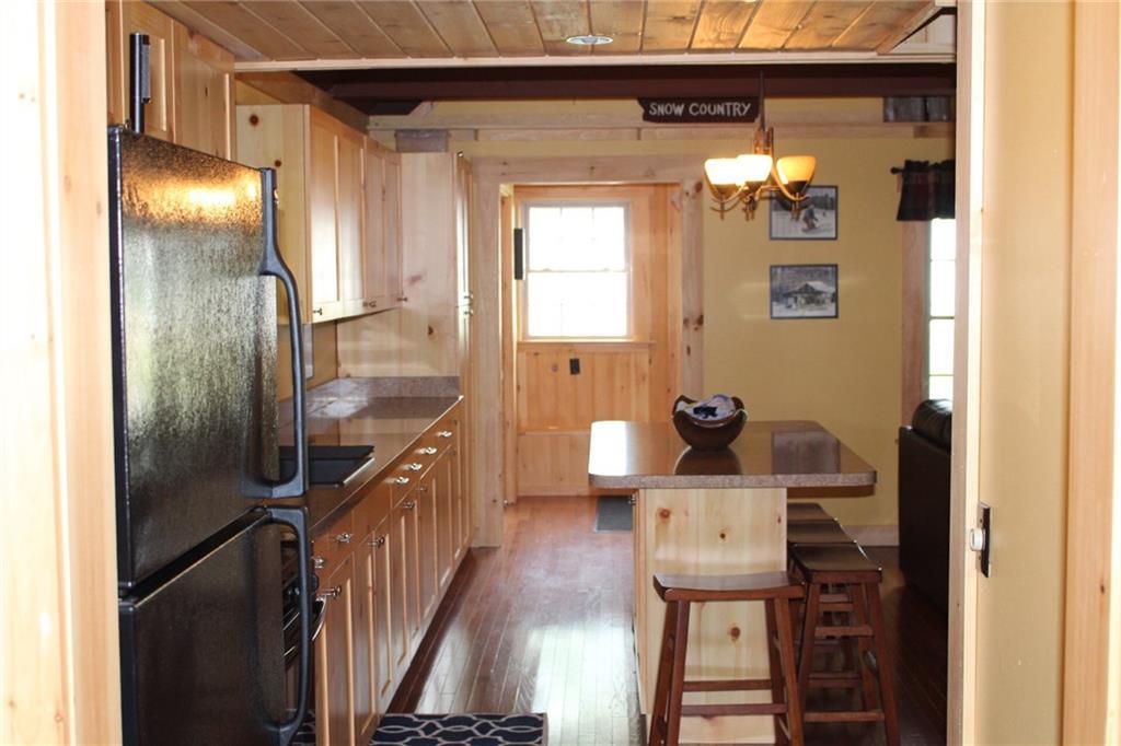 11 Willie Road Stratton, ME 04982 - Photo 11 of 23 View of kitchen looking toward the...