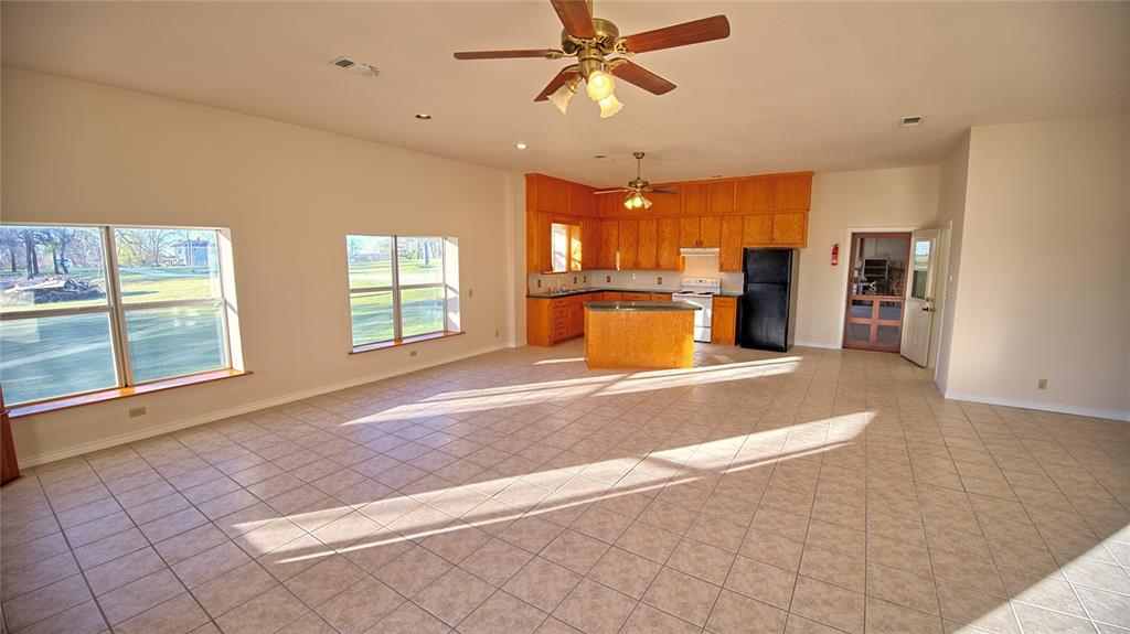 306 Dye Church Road St. Jo, TX 76265 - Photo 11 of 29 a view of a kitchen with a sink and a cabinets