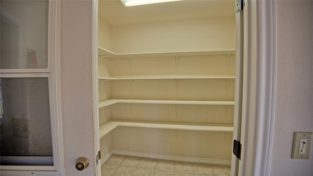 306 Dye Church Road St. Jo, TX 76265 - Photo 19 of 29 a view of an empty walk in closet