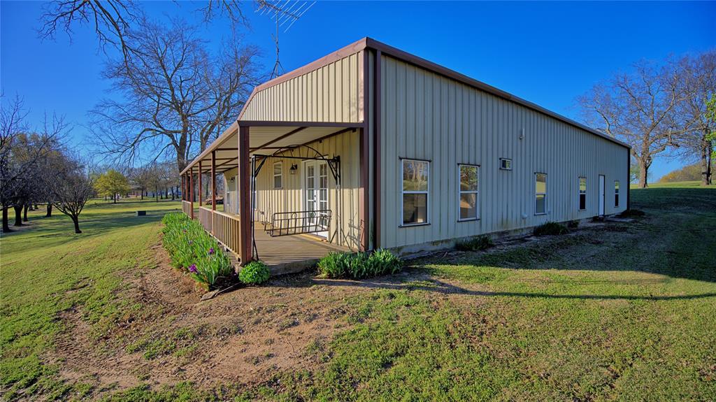 306 Dye Church Road St. Jo, TX 76265 - Photo 24 of 29 a view of a house with backyard and garden