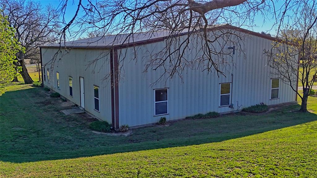 306 Dye Church Road St. Jo, TX 76265 - Photo 6 of 29 a view of a back yard of the house