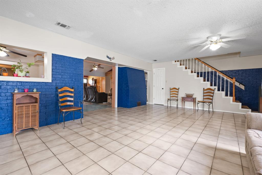 2200 Southeast 26th Avenue Mineral Wells, TX 76067 - Photo 15 of 28 a view of an entryway with wooden floor