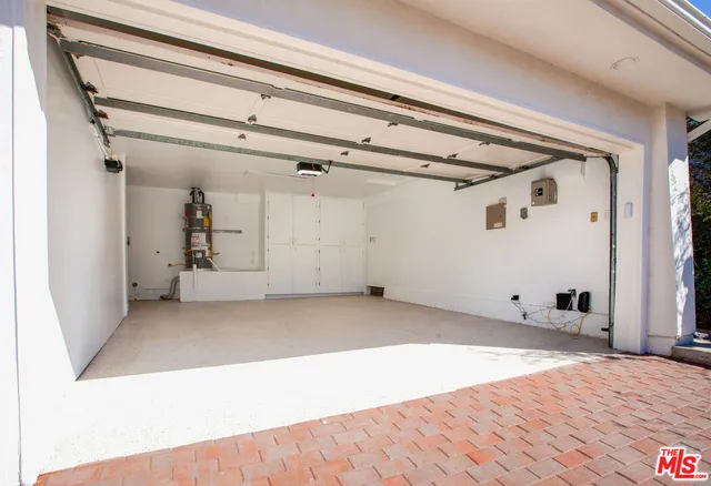 an aerial view of a house with a garden