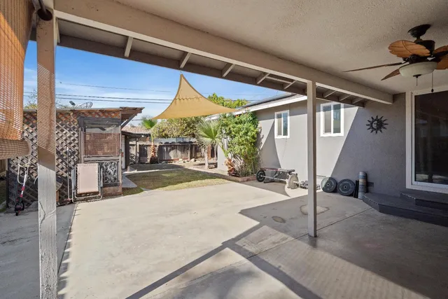 a view of a couches with wooden fence