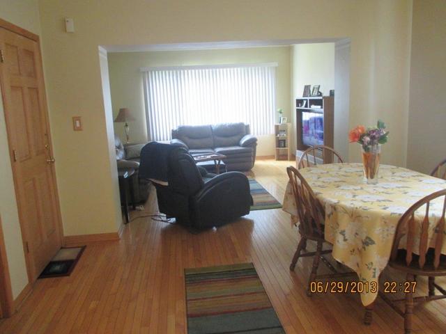 2829 South Lowe Avenue Chicago, IL 60616 - Photo 5 of 11 a view of a dining room with furniture window and wooden floor
