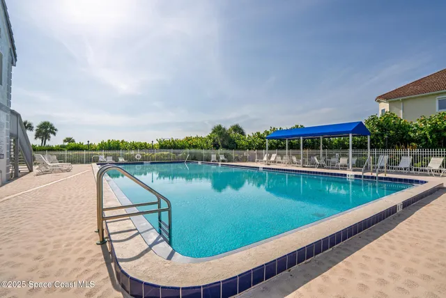 a view of a swimming pool with a lake