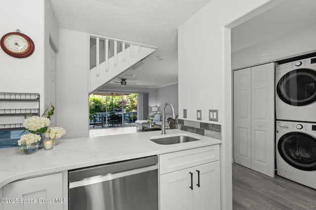 a kitchen with a microwave and a stove