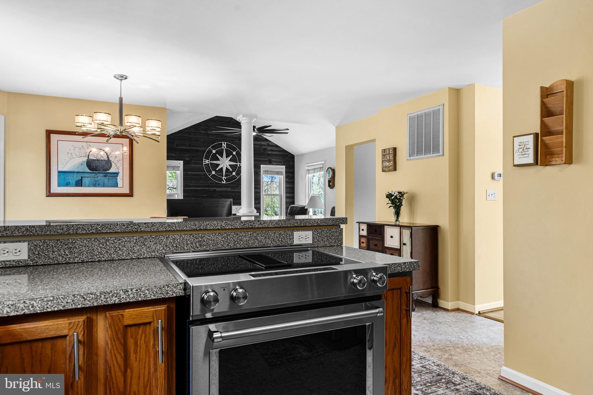1230 Plum Point Road Huntingtown, MD 20639 - Photo 25 of 79 a kitchen with a stove and a sink