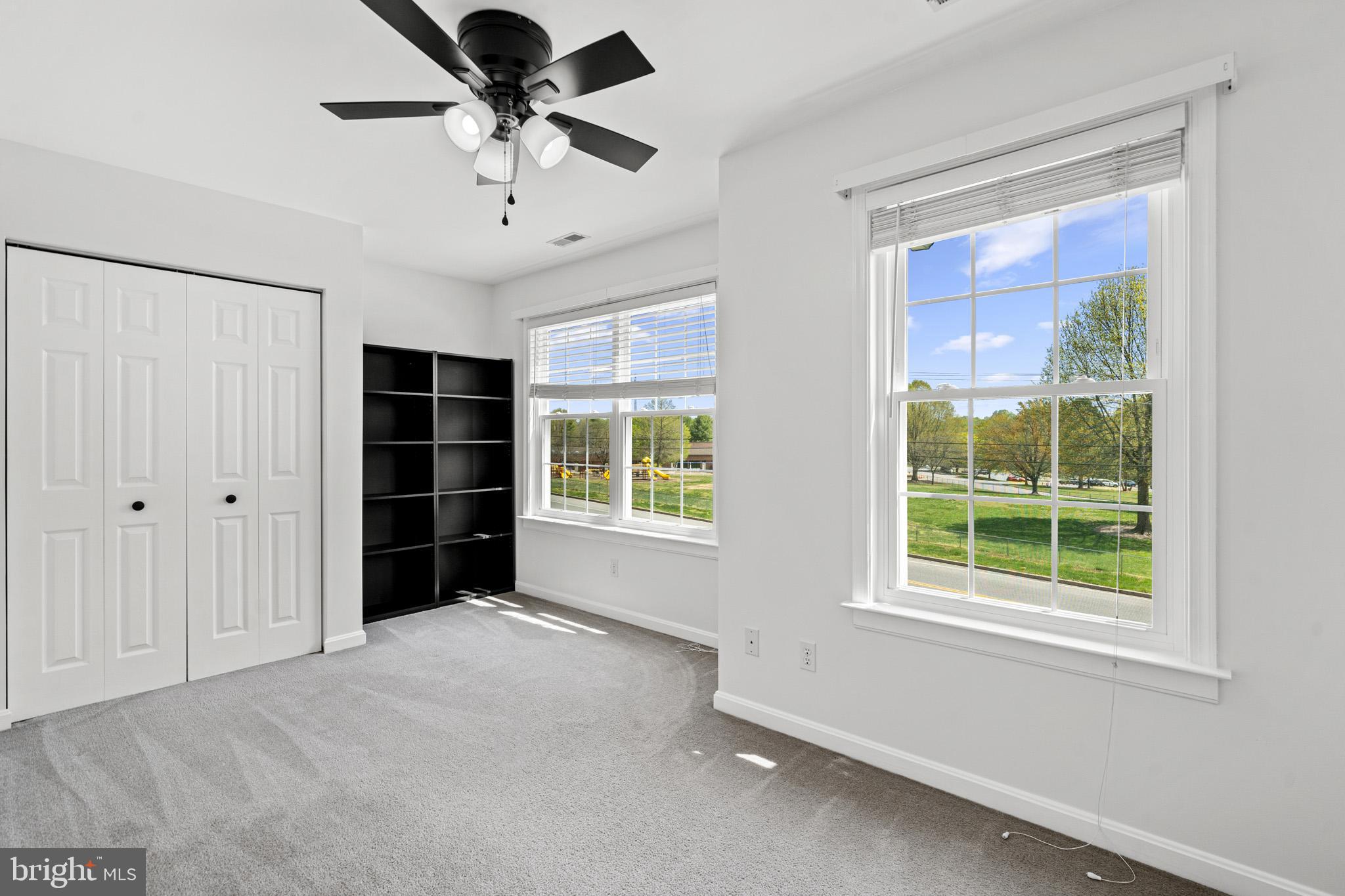 1230 Plum Point Road Huntingtown, MD 20639 - Photo 36 of 79 a view of an empty room with a window and cabinet