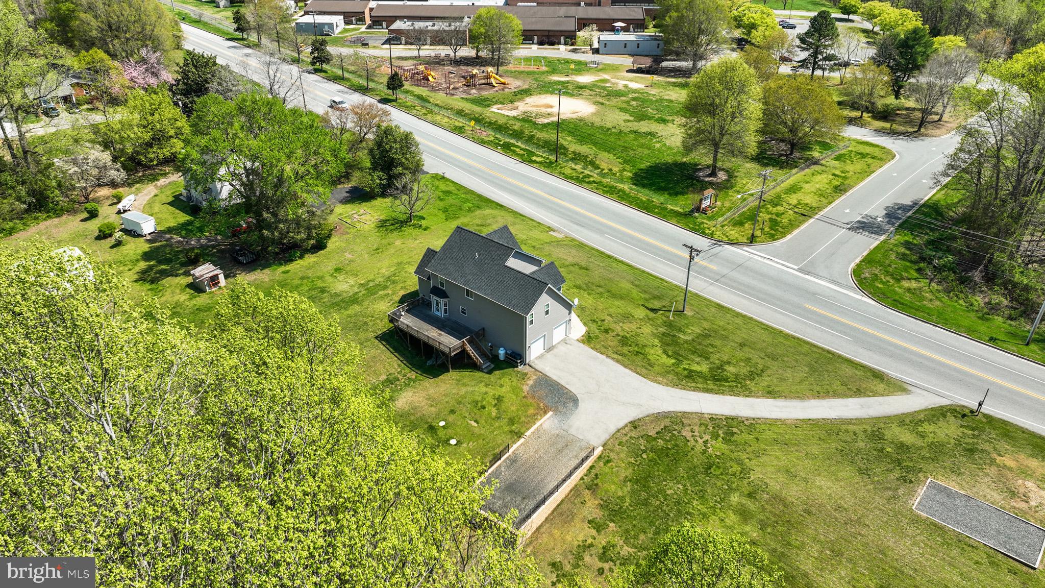 1230 Plum Point Road Huntingtown, MD 20639 - Photo 59 of 79 an aerial view of a residential houses with outdoor space