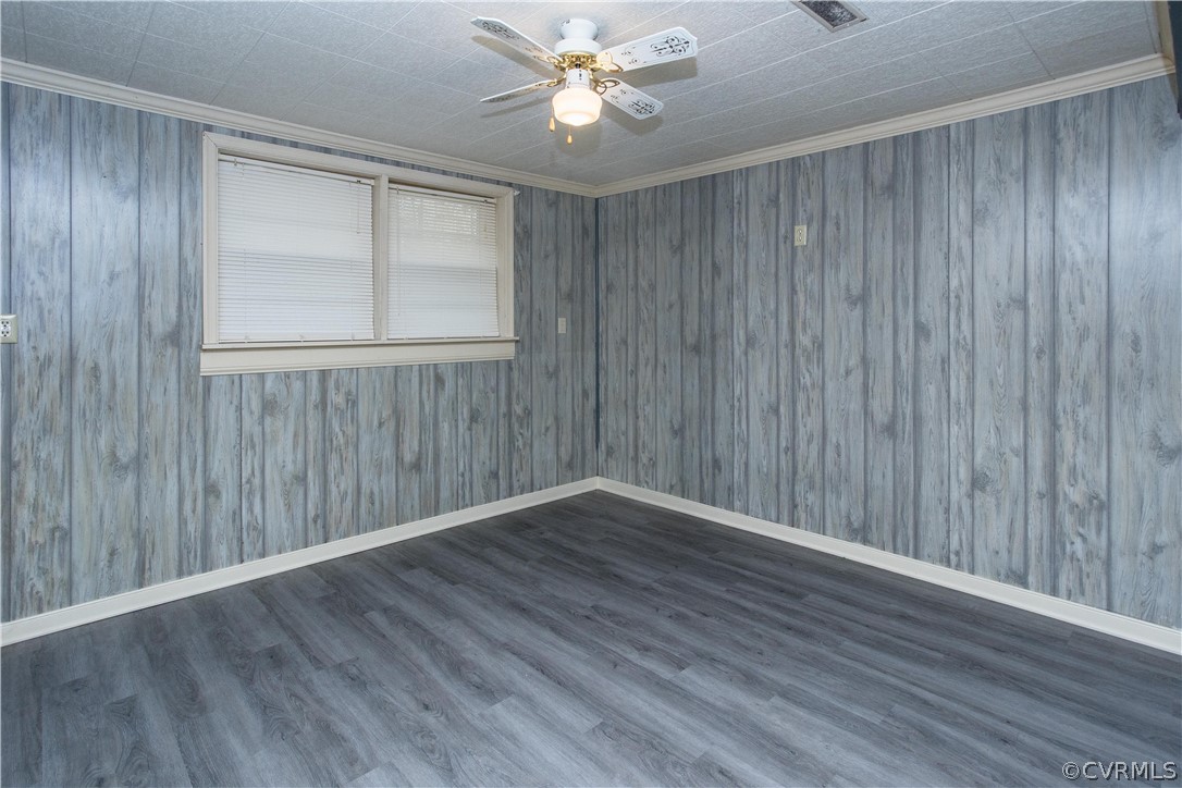 11608 Bundle Road Chesterfield, VA 23838 - Photo 19 of 19 an empty room with wooden floor chandelier fan and windows