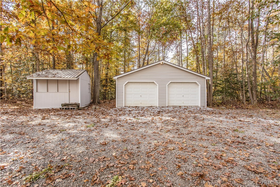 11608 Bundle Road Chesterfield, VA 23838 - Photo 5 of 19 a front view of a house with a garden