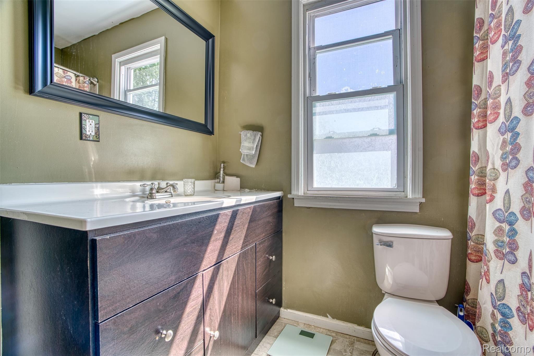 2980 Baseline Road Stockbridge, MI 49285 - Photo 16 of 28 Updated bathroom