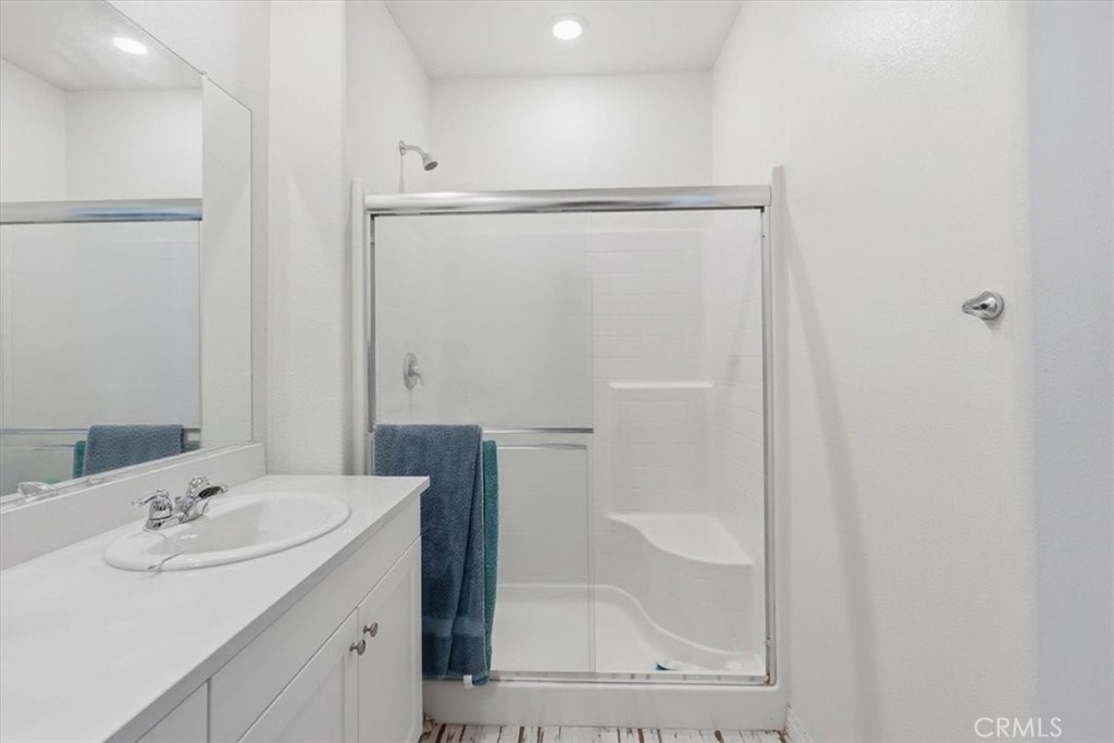 32350 Iron Trail Road Winchester, CA 92596 - Photo 20 of 32 a bathroom with a sink and a mirror