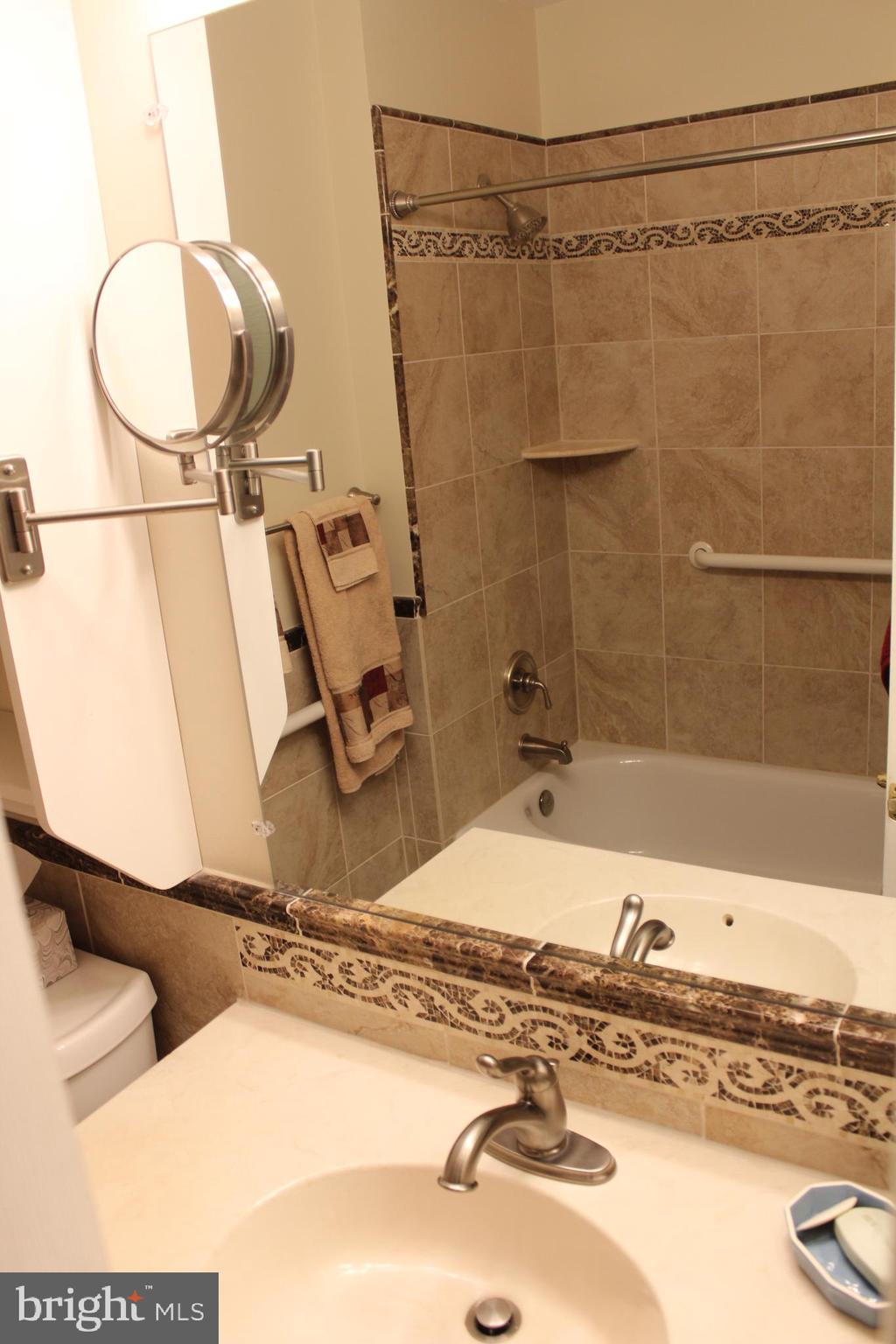 8218 Dabney Avenue Springfield, VA 22152 - Photo 19 of 33 Renovated Hall Bath