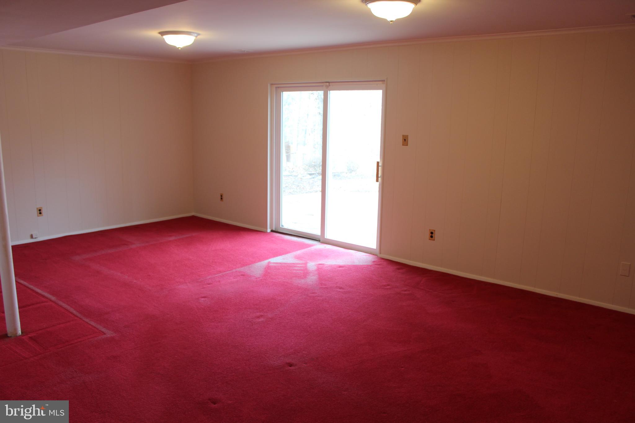 8218 Dabney Avenue Springfield, VA 22152 - Photo 22 of 33 Rec Room - showing walk-out sliding glass door