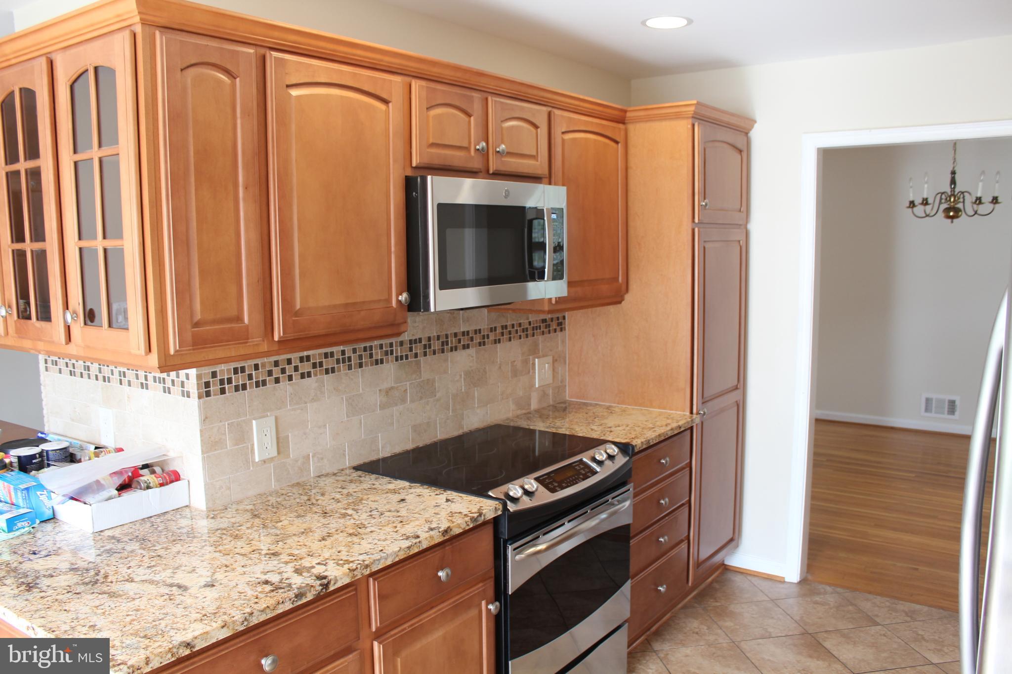 8218 Dabney Avenue Springfield, VA 22152 - Photo 3 of 33 Kitchen - stainless steel appliances
