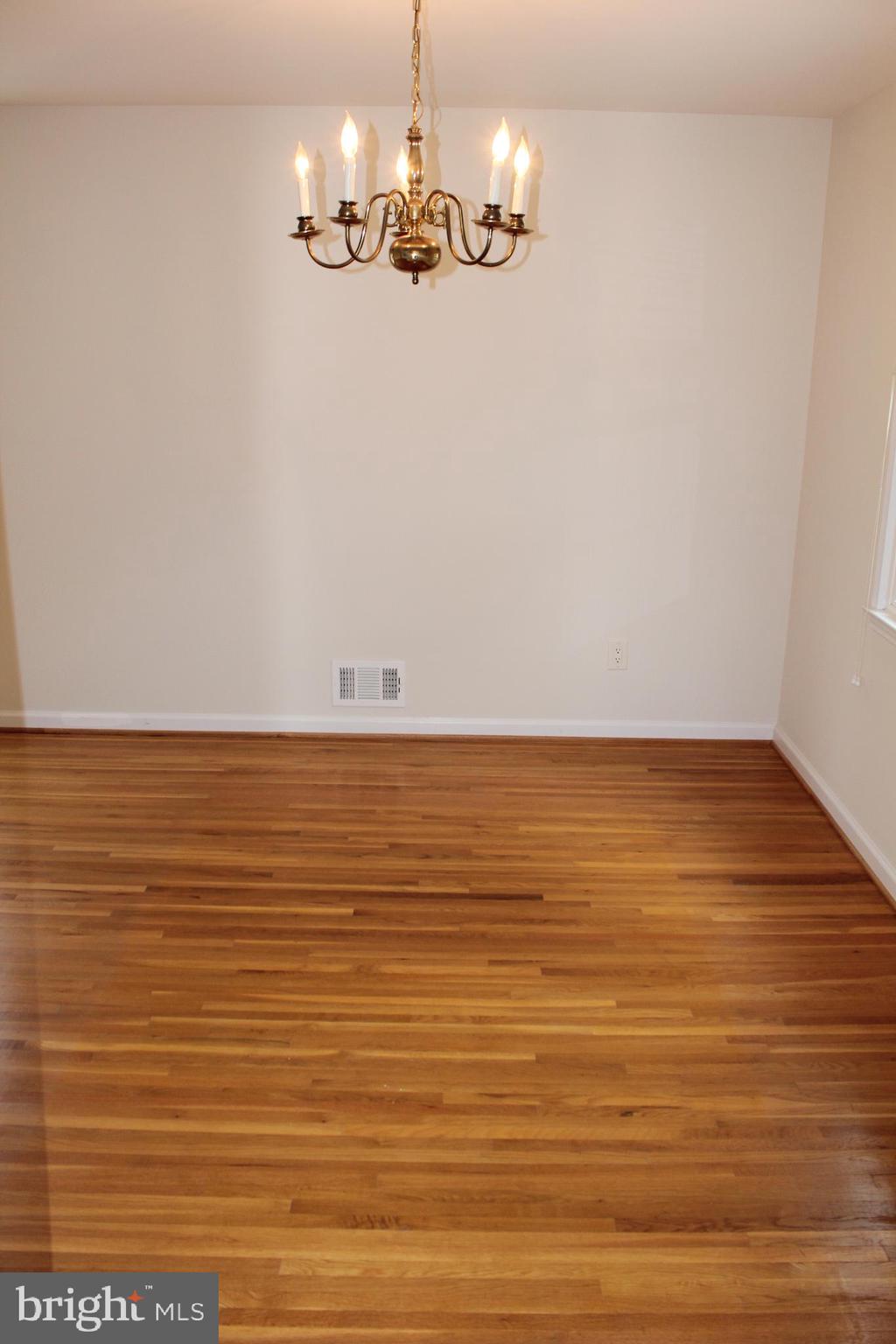 8218 Dabney Avenue Springfield, VA 22152 - Photo 7 of 33 Dining Room - hardwood floors