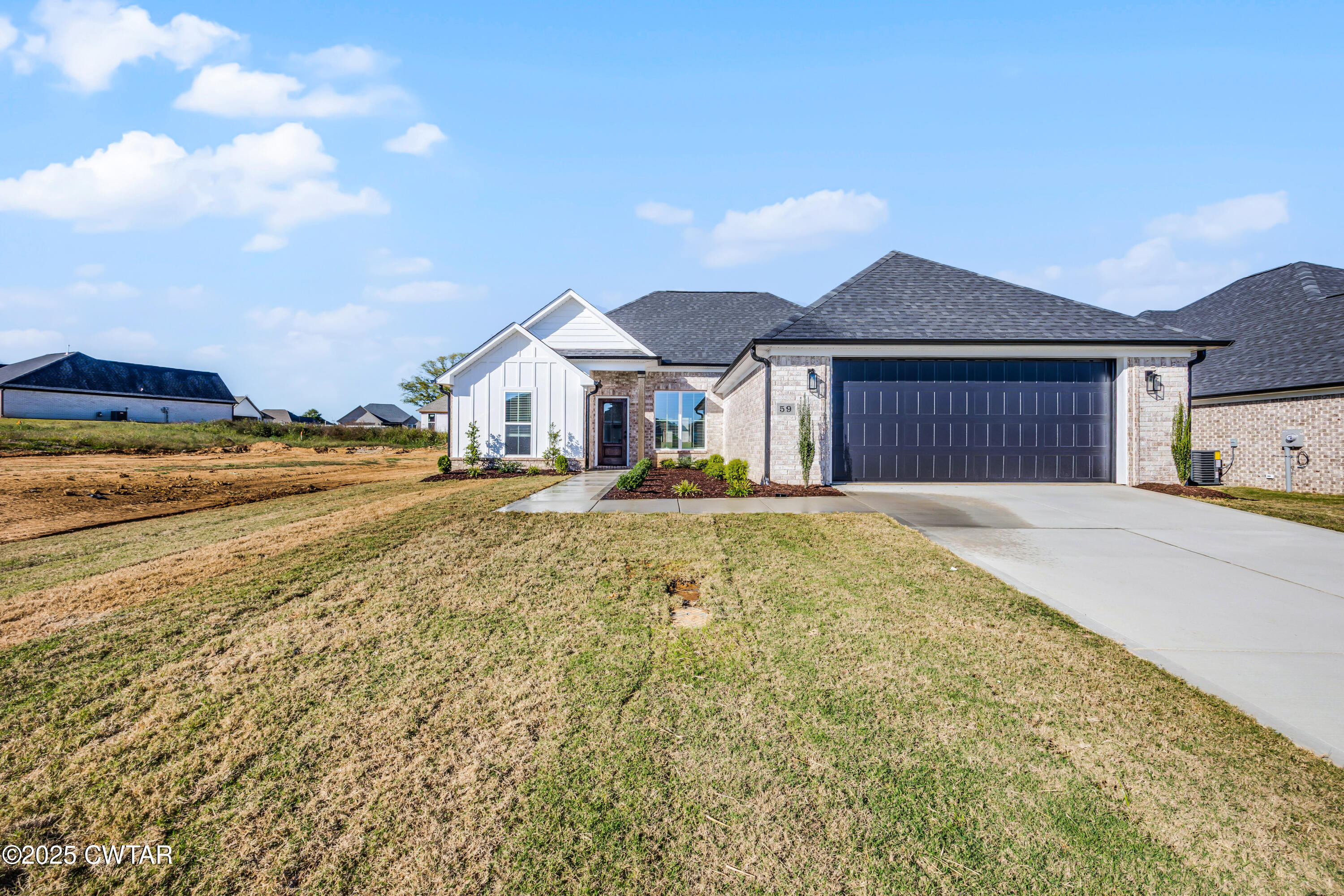 a house with swimming pool in front of it