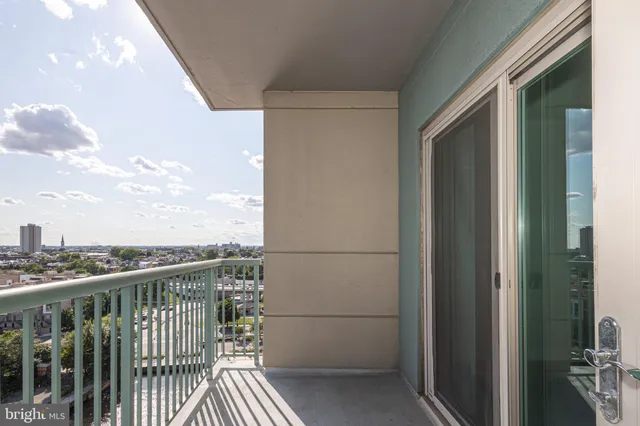 a view of a terrace with furniture and stove
