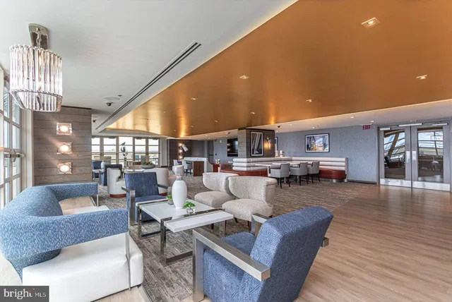 a kitchen with stainless steel appliances granite countertop a sink and a stove