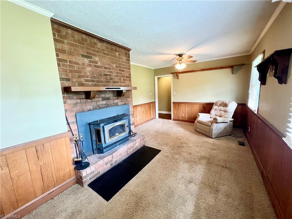3684 Oak Ridge Road Summerfield, NC 27358 - Photo 11 of 42 Den has fireplace insert with fan blower