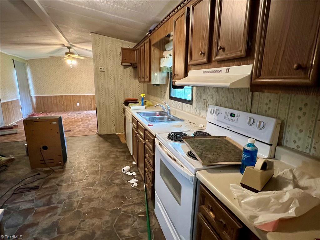 3684 Oak Ridge Road Summerfield, NC 27358 - Photo 32 of 42 Mobile home kitchen