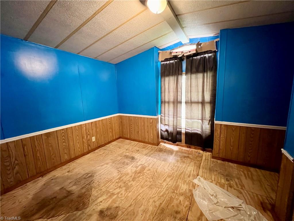 3684 Oak Ridge Road Summerfield, NC 27358 - Photo 37 of 42 mobile home 2nd bedroom floor has been replaced