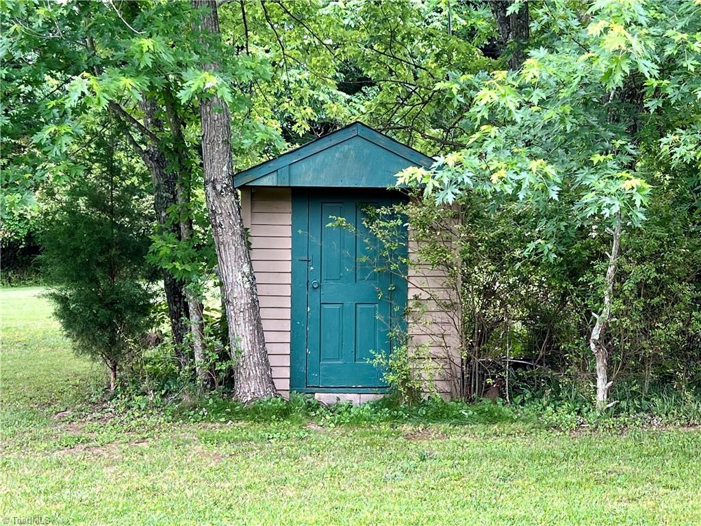 3684 Oak Ridge Road Summerfield, NC 27358 - Photo 40 of 42 Small storage building in back yard