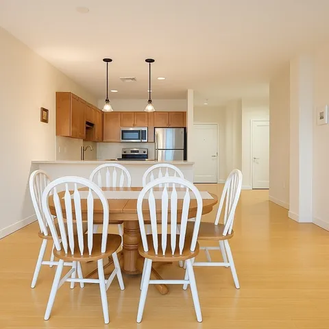 a view of a dining room with furniture