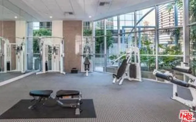 a view of a room with gym equipment