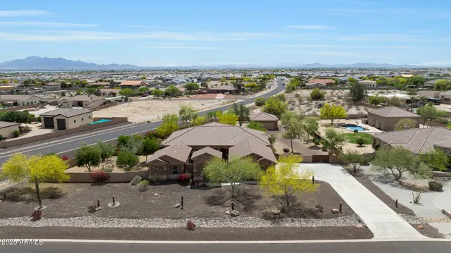 an aerial view of residential building and lake view