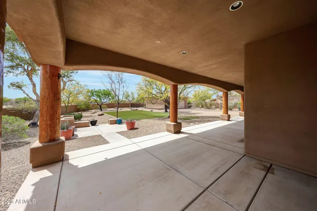 a view of a park with large trees