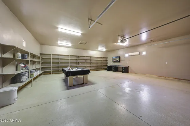 an aerial view of residential house and outdoor space