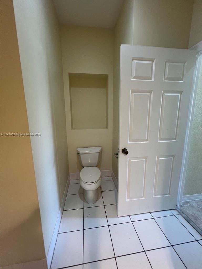 23712 Southwest 110th Avenue Homestead, FL 33032 - Photo 15 of 41 a bathroom with a toilet