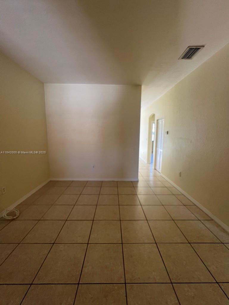 23712 Southwest 110th Avenue Homestead, FL 33032 - Photo 7 of 41 a view of an empty room