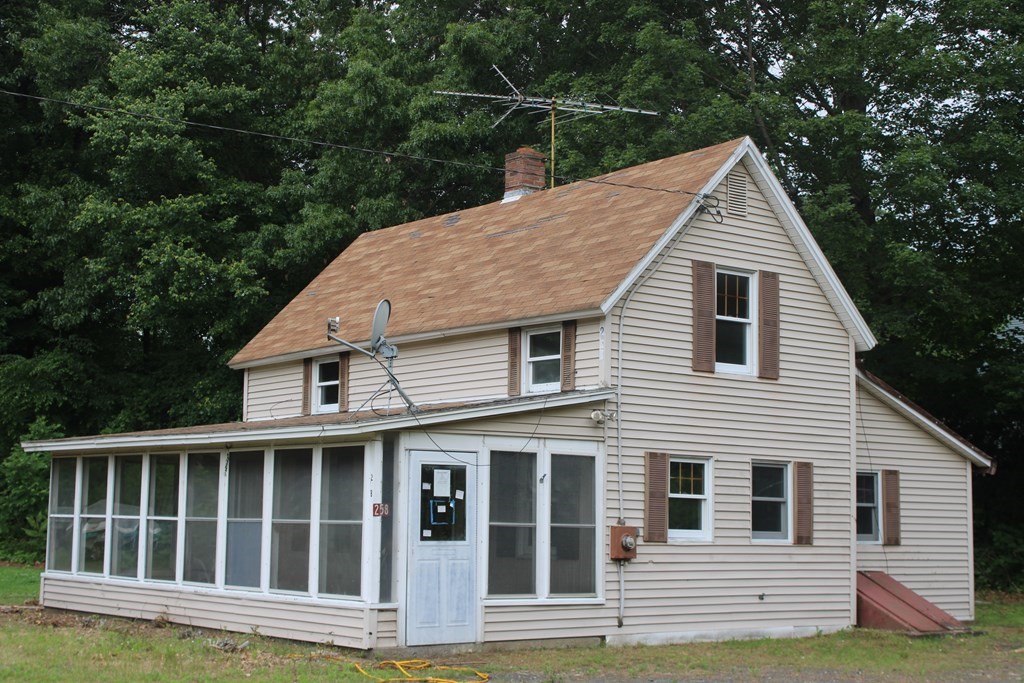258 Plumtree Road Sunderland, MA 01375 - Photo 1 of 17 a view of a house with a yard
