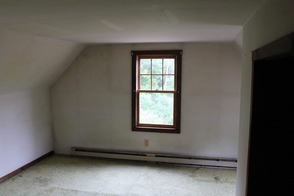 258 Plumtree Road Sunderland, MA 01375 - Photo 13 of 17 an empty room with a window