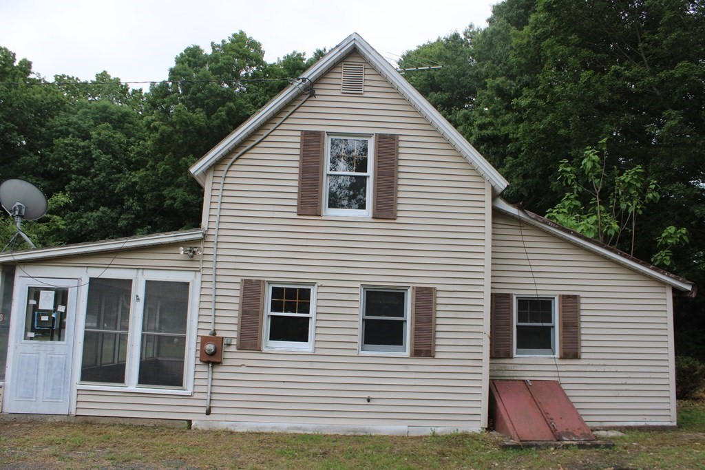 258 Plumtree Road Sunderland, MA 01375 - Photo 16 of 17 a view of a house with a garage