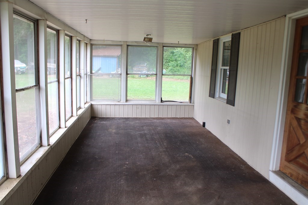258 Plumtree Road Sunderland, MA 01375 - Photo 4 of 17 a view of an empty room with a window