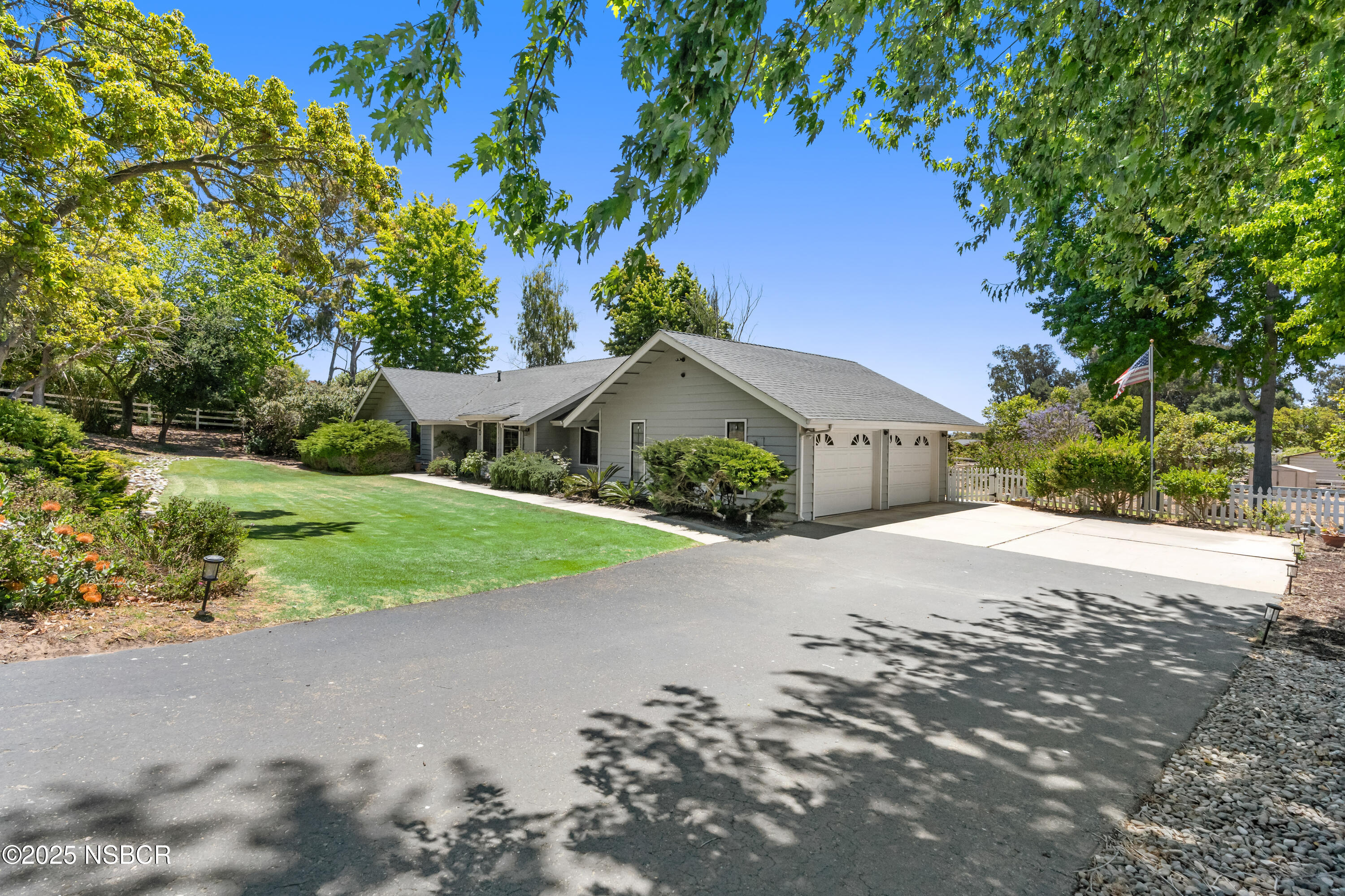181 Eucalyptus Road Nipomo, CA 93444 - Photo 2 of 36 a house with a yard