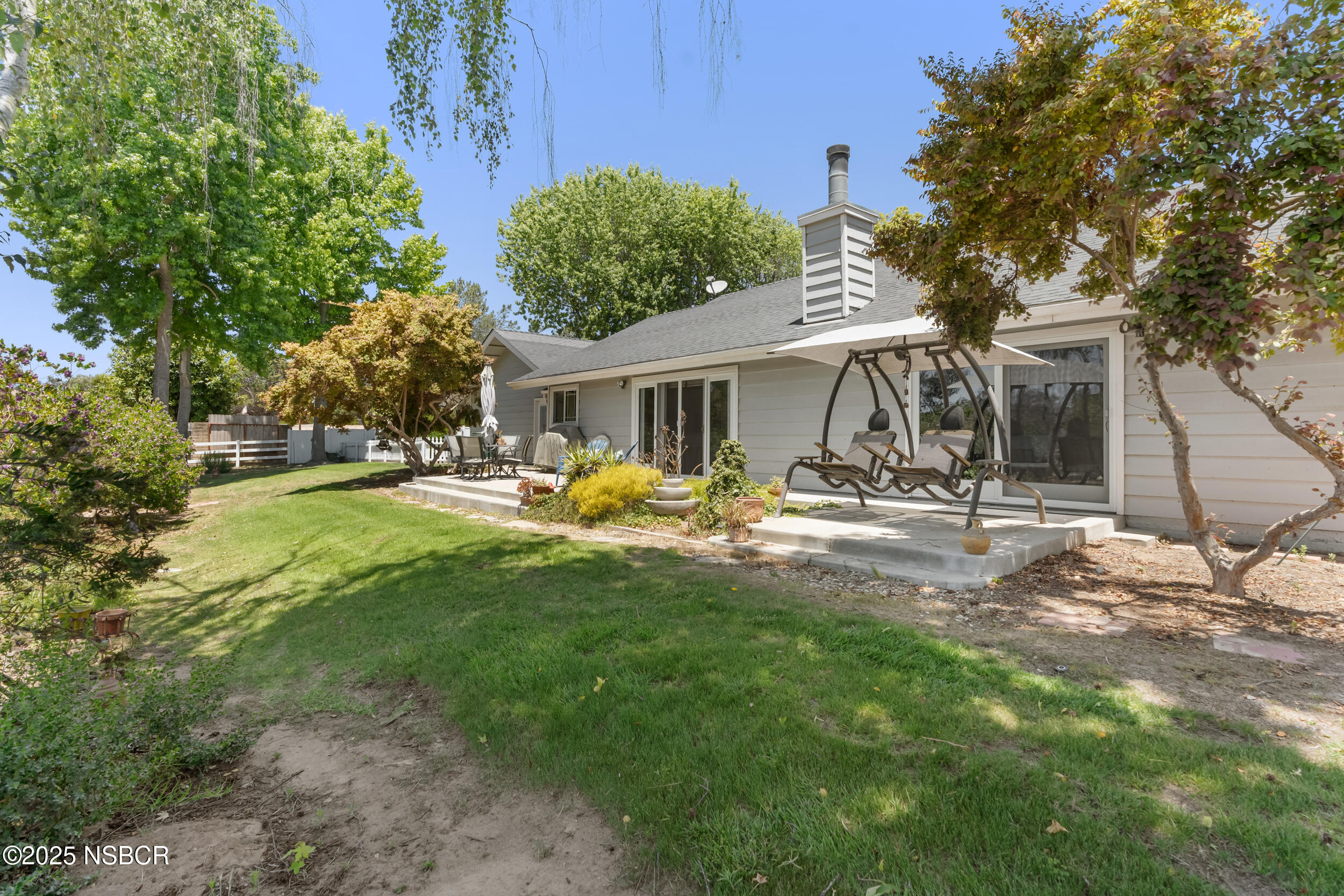 181 Eucalyptus Road Nipomo, CA 93444 - Photo 26 of 36 a view of a house with backyard porch and sitting area