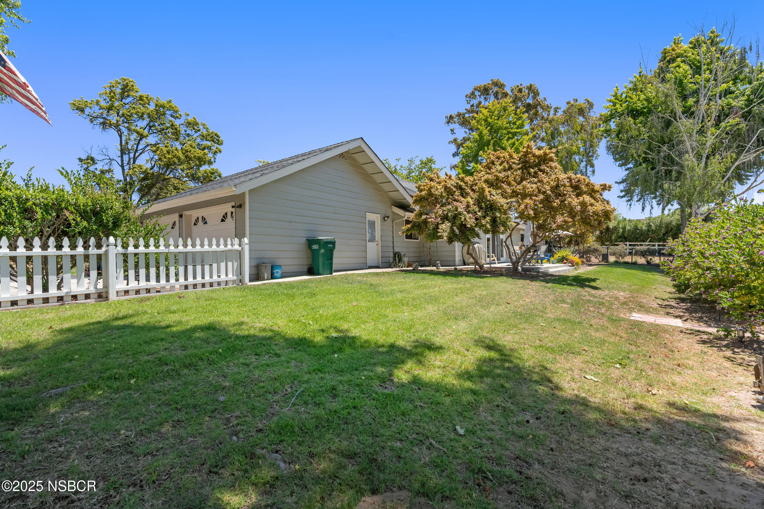 181 Eucalyptus Road Nipomo, CA 93444 - Photo 27 of 36 a view of an house with backyard space and garden