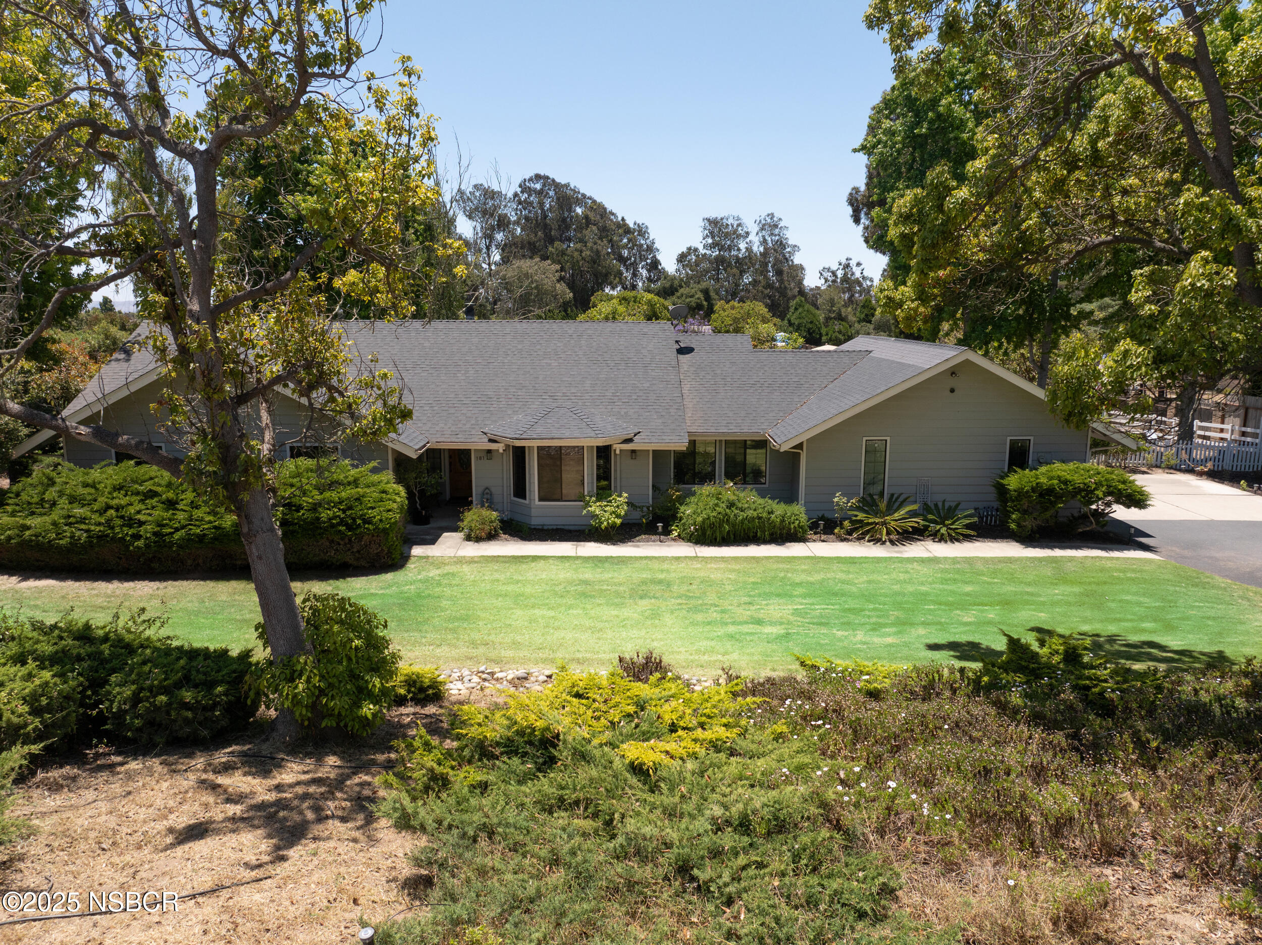 181 Eucalyptus Road Nipomo, CA 93444 - Photo 36 of 36 a front view of house with yard and green space