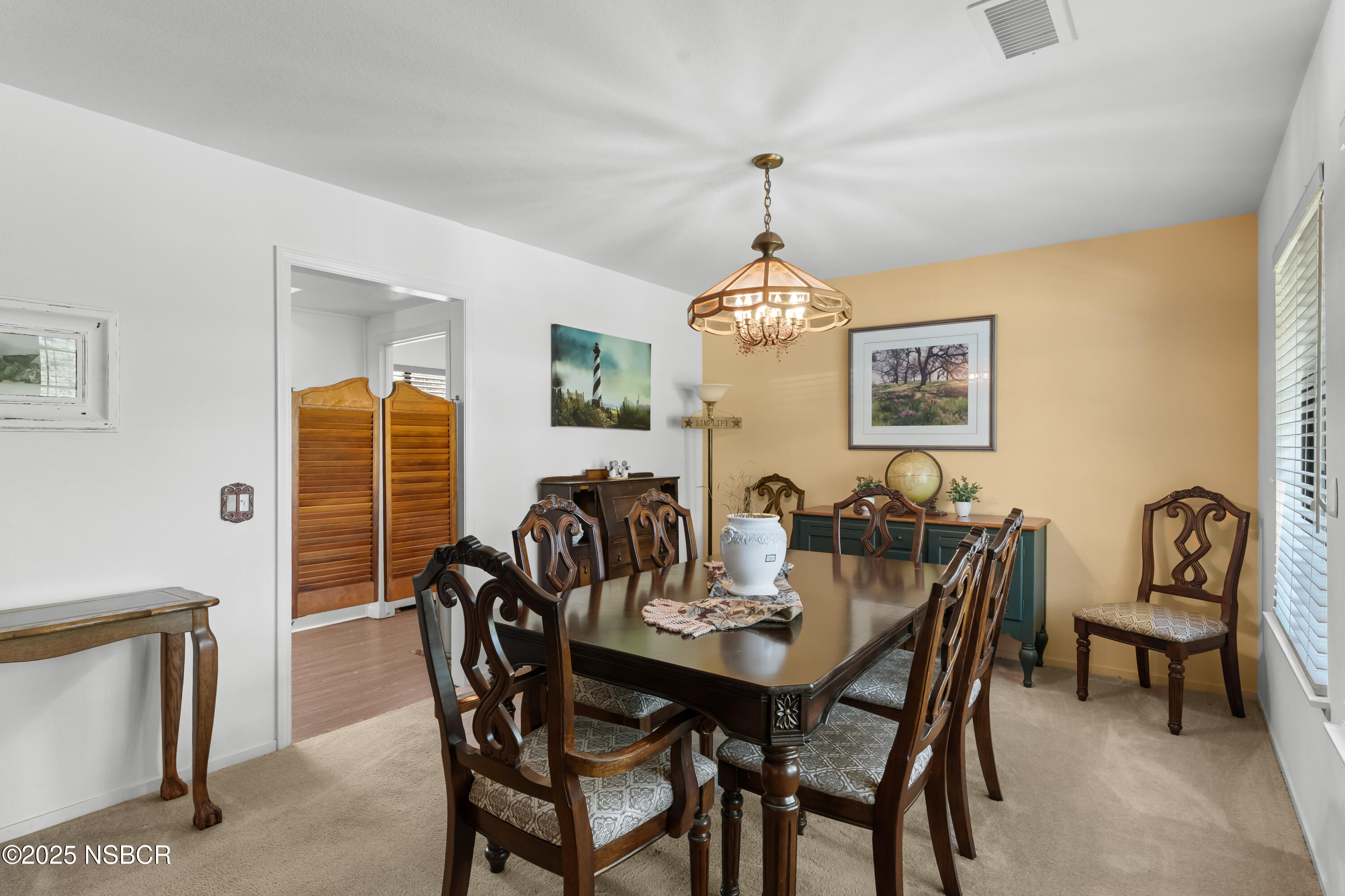 181 Eucalyptus Road Nipomo, CA 93444 - Photo 7 of 36 a view of a dining room with furniture