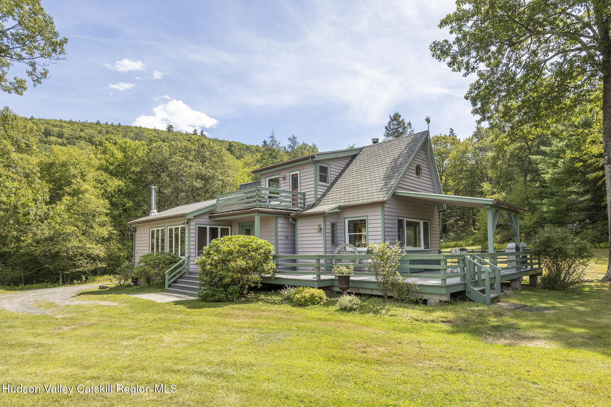 128 Newcut Road Woodstock, NY 12498 - Photo 1 of 51 a front view of house with swimming pool and green space