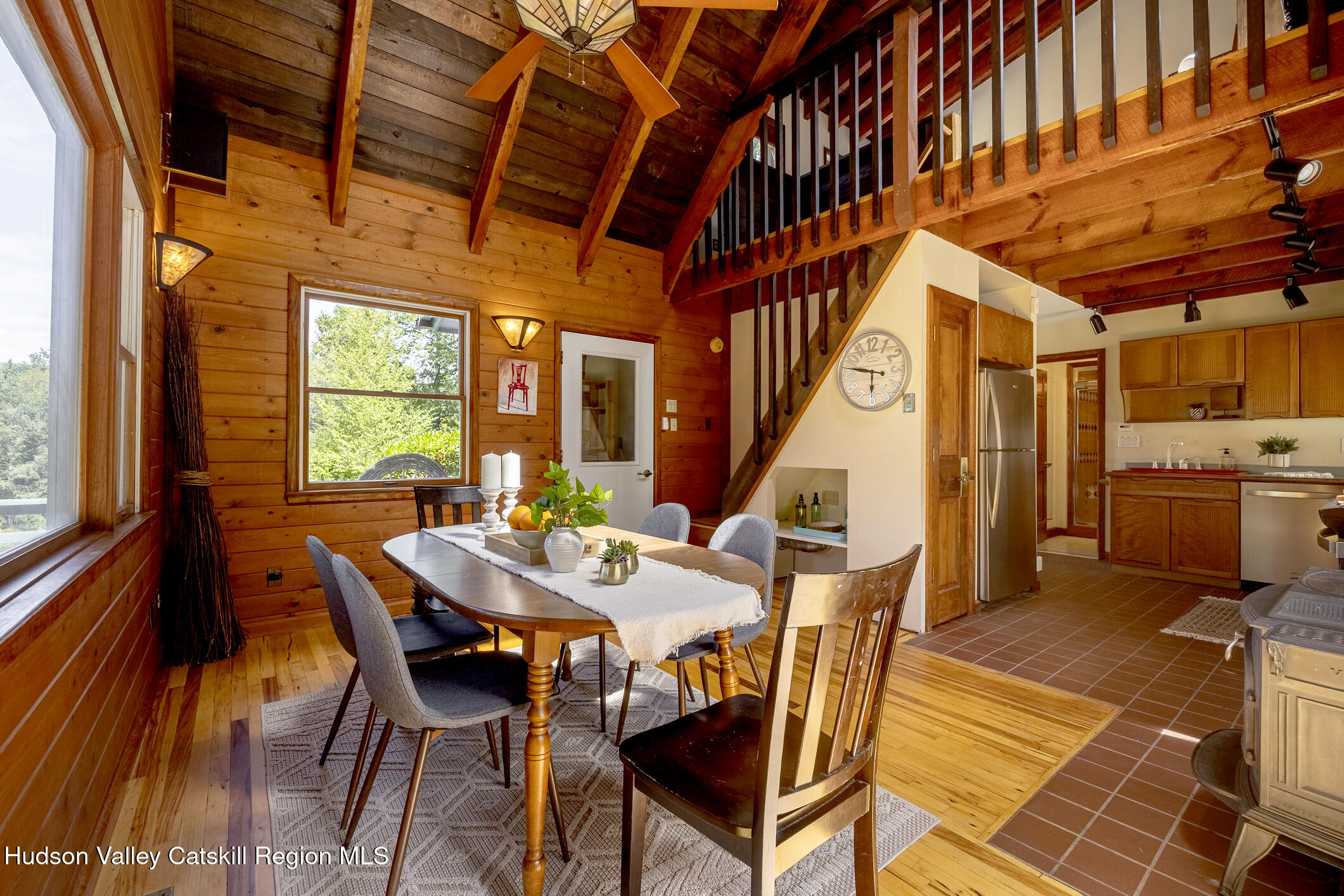 128 Newcut Road Woodstock, NY 12498 - Photo 11 of 51 a view of a dining room with furniture window and wooden floor