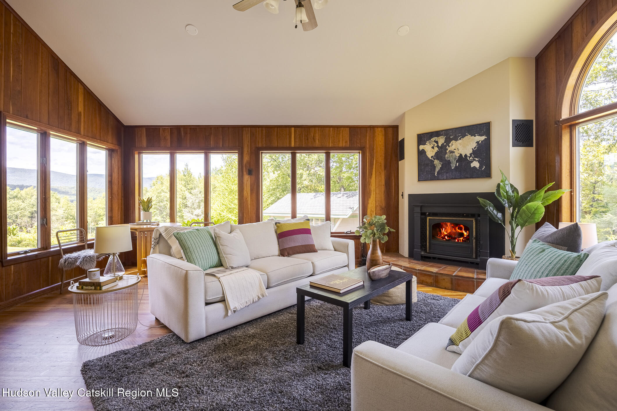 128 Newcut Road Woodstock, NY 12498 - Photo 12 of 51 a living room with furniture and a fireplace